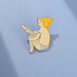 Pin’s body positive illustré célébrant les poils fémininsPin’s body positive illustré célébrant les poils féminins