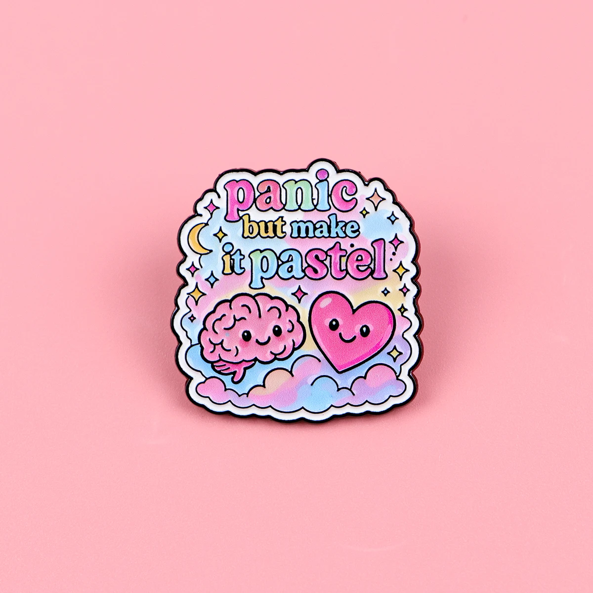 Pin’s Panic but Make It Pastel sur fond rose